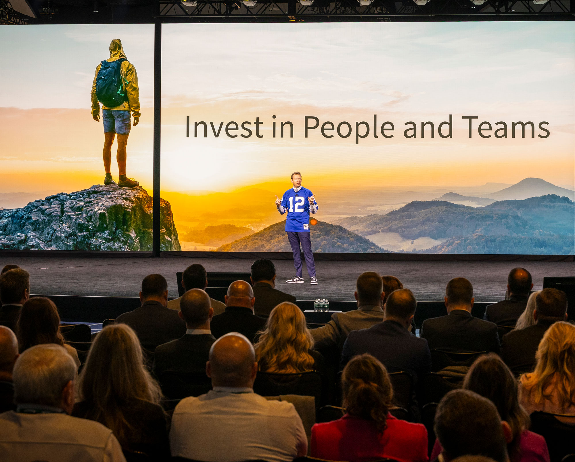 Audience engaged during a corporate general session presentation