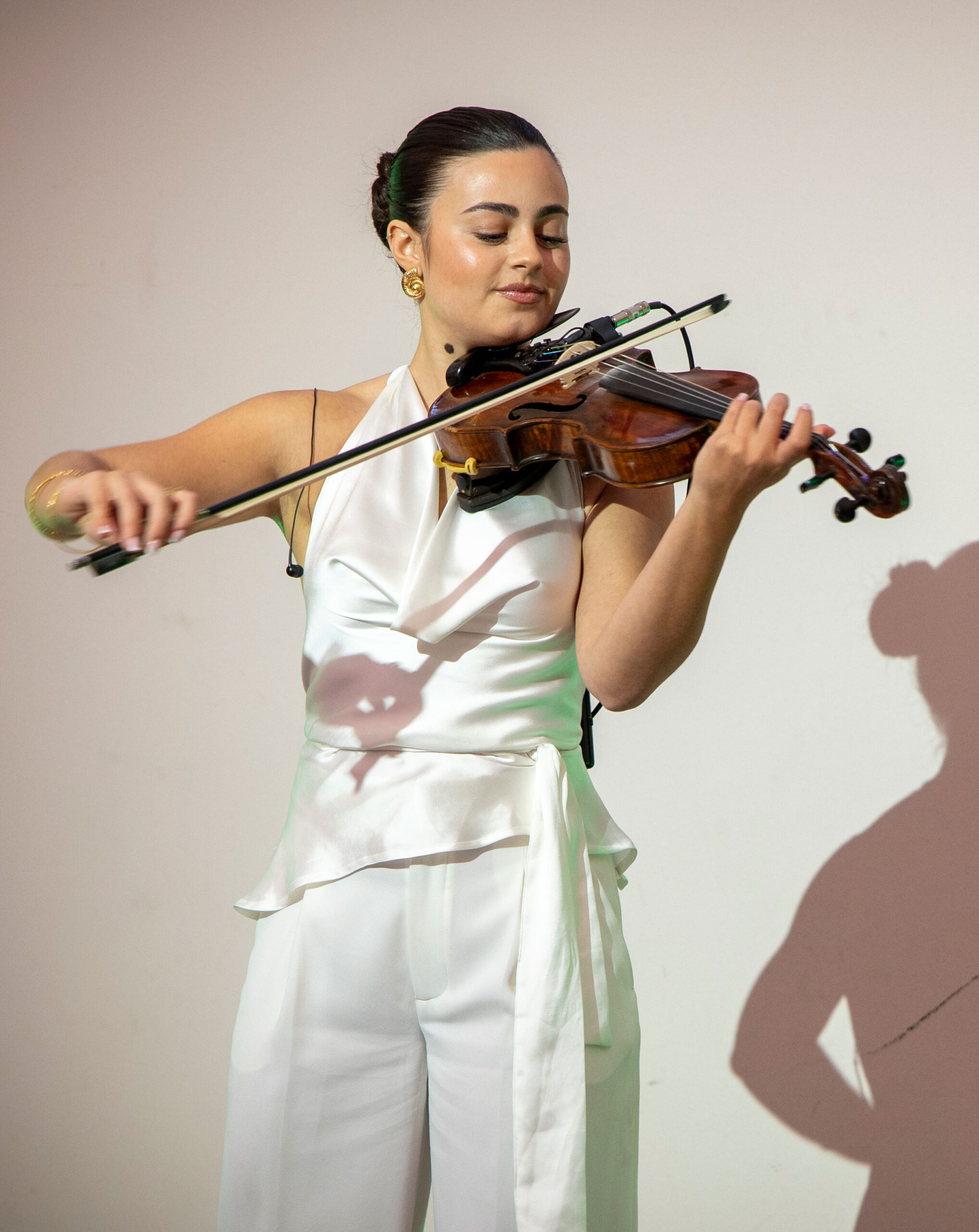 Guests enjoying entertainment at a gala dinner event