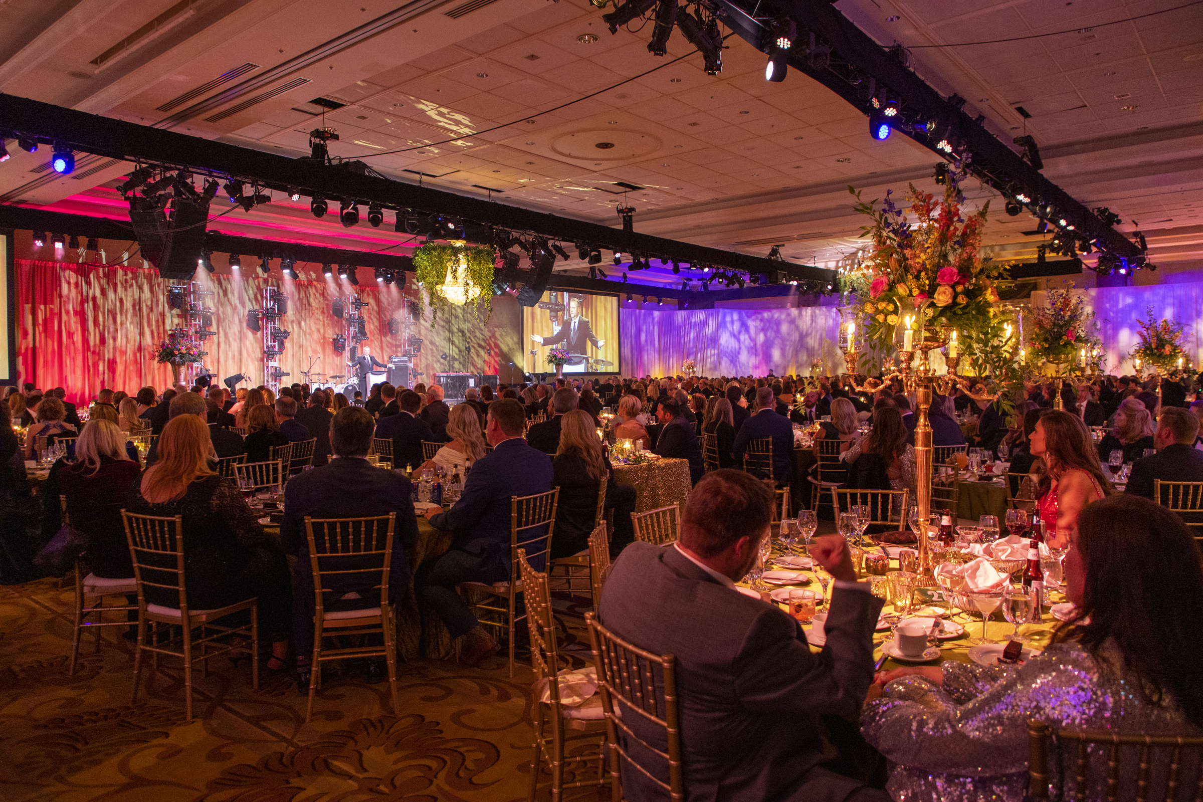 Attendees dancing at a gala evening celebration